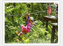Girl going down zip line